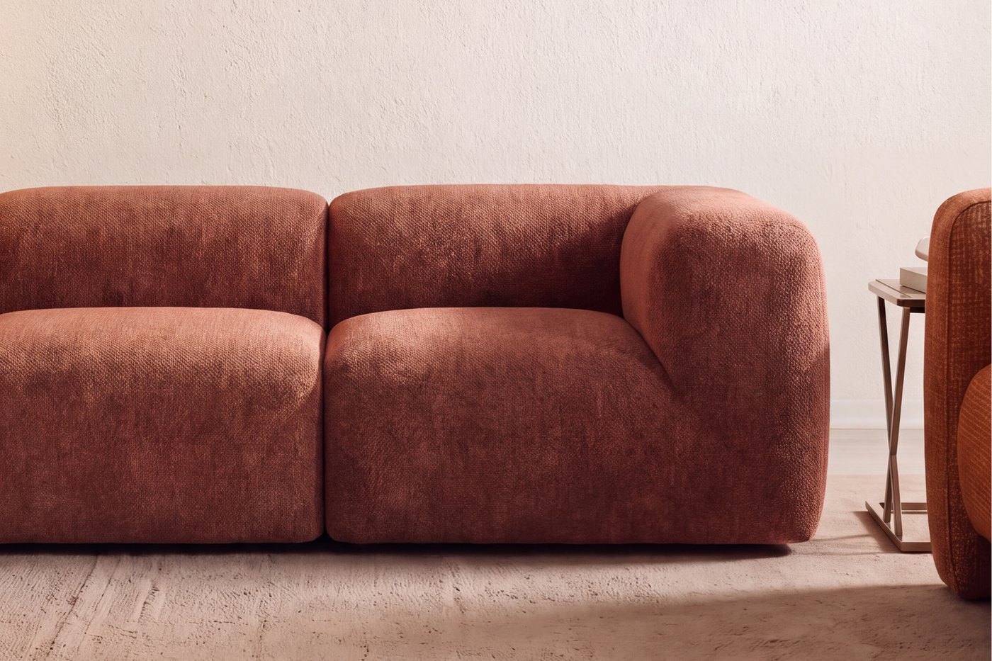 Catan sofa in terracotta in a living room