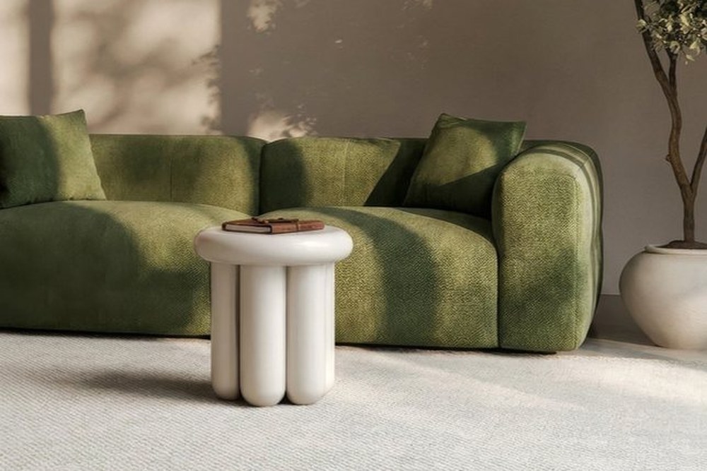 Geno sofa in olive green in a living room